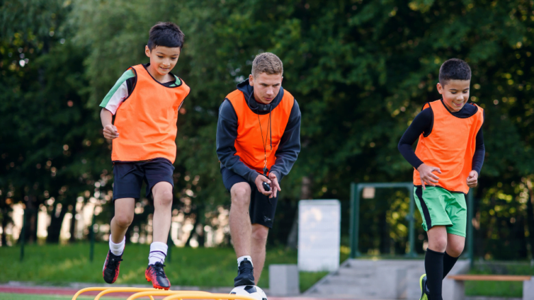 boys playing football