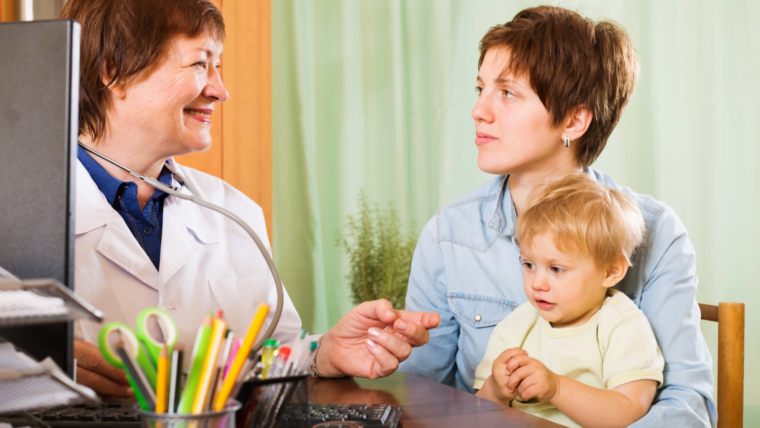 Free photo mother with baby listening pediatrician doctor
