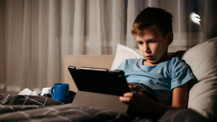 Young Boy watching on screen media